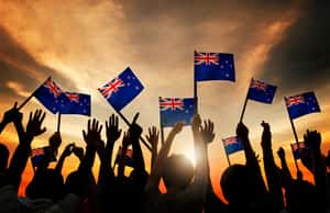 Люди с флагами Новой Зеландии